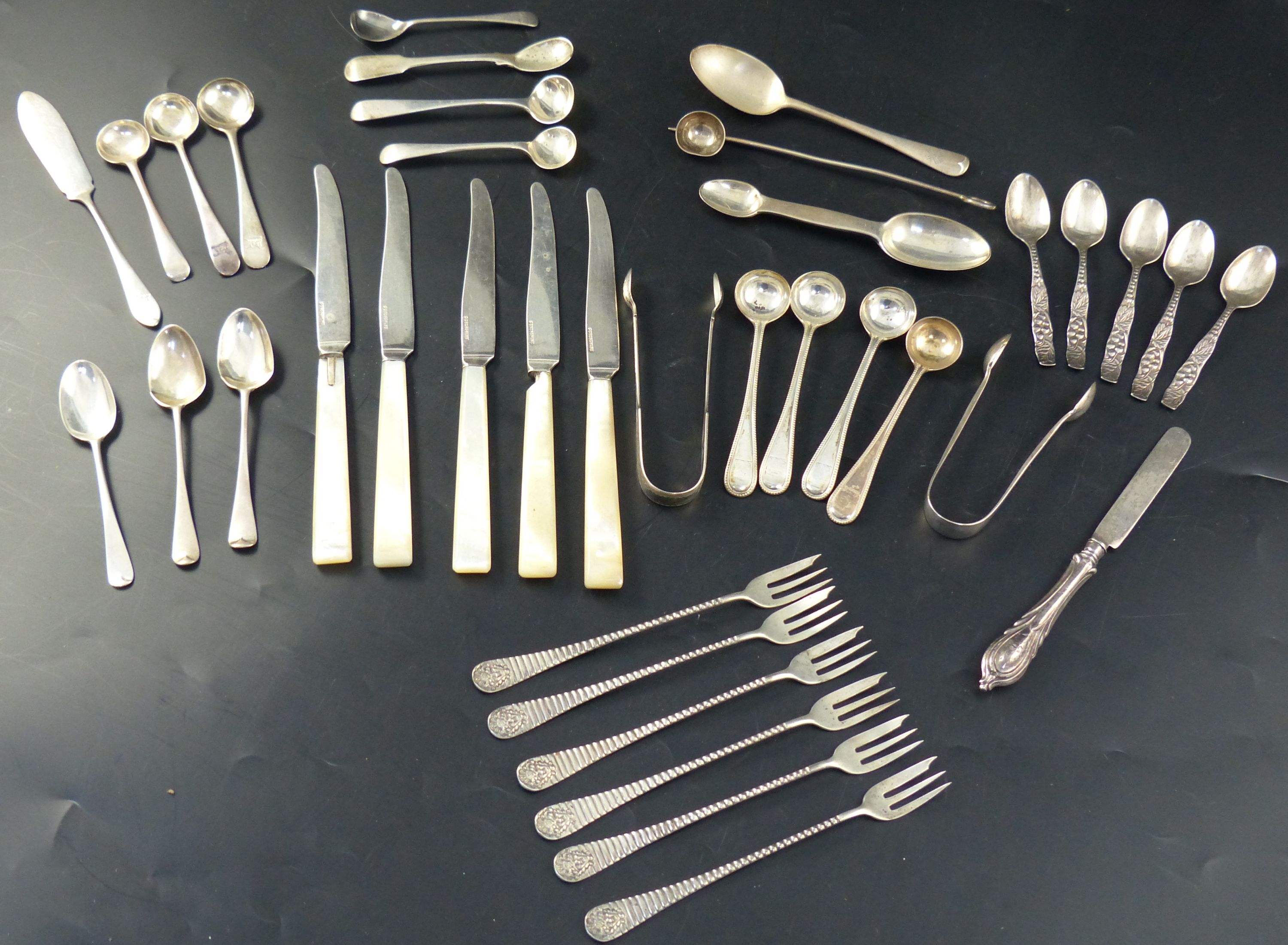 A collection of minor flatware